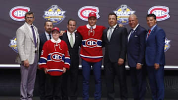 Jun 24, 2016; Buffalo, NY, USA; Mikhail Sergachev poses for a photo after being selected as the number nine overall draft pick by the Montreal Canadiens in the first round of the 2016 NHL Draft at the First Niagra Center. Mandatory Credit: Timothy T. Ludwig-USA TODAY Sports
