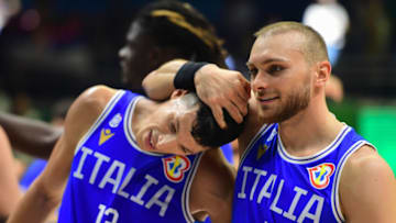 QUEZON, PHILIPPINES - 2023/09/01: Simone Fontecchio (L) of the Italy men basketball team and Stefano Tonut (R) of the Italy men basketball team in action during the FIBA Men's Basketball World Cup 2023 match between Serbia and Italy at the Araneta Coliseum. Final Score Italy 78:76 Serbia. (Photo by Luis Veniegra/SOPA Images/LightRocket via Getty Images)