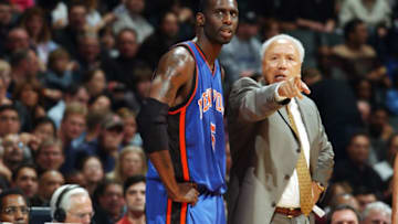 TORONTO - MARCH 5: Head Coach Lenny Wilkens instructs Tim Thomas #5 of the New York Knicks from the sidelines during the Knicks game versus the Toronto Raptors on March 5, 2004 at the Air Canada Centre in Toronto, Canada. NOTE TO USER: User expressly acknowledges and agrees that, by downloading and or using this photograph, User is consenting to the terms and conditions of the Getty Images License Agreement. (Photo by Ron Turenne/NBAE via Getty Images)