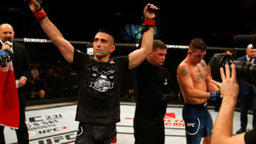 BUENOS AIRES, ARGENTINA - NOVEMBER 17: (L-R) Ricardo Lamas celebrates after defeating Darren Elkins in their featherweight bout during the UFC Fight Night event inside Arena Parque Roca on November 17, 2018 in Buenos Aires, Argentina. (Photo by Alexandre Schneider/Zuffa LLC/Zuffa LLC via Getty Images)