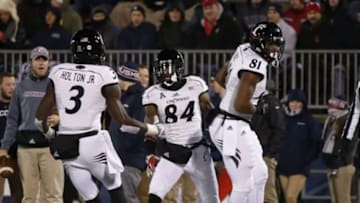 Nov 22, 2014; East Hartford, CT, USA; Cincinnati Bearcats wide receiver Nate Cole (84) reacts with his teammate after his touchdown catch against the Connecticut Huskies in the first quarter at Rentschler Field. Mandatory Credit: David Butler II-USA TODAY Sports
