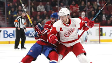 Nov 12, 2016; Montreal, Quebec, CAN; Montreal Canadiens right wing Alexander Radulov (47) falls on ice as he battled for the puck with Detroit Red Wings left wing Justin Abdelkader (8) during the third period at Bell Centre. Mandatory Credit: Jean-Yves Ahern-USA TODAY Sports