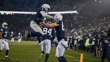 STATE COLLEGE, PA - NOVEMBER 24: Pat Freiermuth #87 of the Penn State Nittany Lions celebrates with KJ Hamler #1 after scoring a touchdown against the Maryland Terrapins during the second half at Beaver Stadium on November 24, 2018 in State College, Pennsylvania. (Photo by Scott Taetsch/Getty Images)