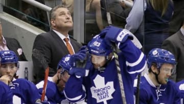 Mar 23, 2015; Toronto, Ontario, CAN; Toronto Maple Leafs interim head coach Peter Horachek looks up at the scoreboard during a break in the action against Minnesota Wild at the Air Canada Centre. Minnesota defeated Toronto 2-1. Mandatory Credit: John E. Sokolowski-USA TODAY Sports