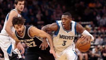 Dec 6, 2016; Minneapolis, MN, USA; Minnesota Timberwolves guard Kris Dunn (3) dribbles in the second quarter against the San Antonio Spurs guard Nicolas Laprovittola (27) at Target Center. Mandatory Credit: Brad Rempel-USA TODAY Sports