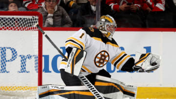 NEWARK, NEW JERSEY - NOVEMBER 13: Jeremy Swayman #1 of the Boston Bruins stops a shot in the third period against the New Jersey Devils at Prudential Center on November 13, 2021 in Newark, New Jersey. The Boston Bruins defeated the New Jersey Devils 5-2. (Photo by Elsa/Getty Images)