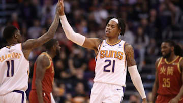 PHOENIX, ARIZONA - FEBRUARY 04: Richaun Holmes #21 of the Phoenix Suns high fives Jamal Crawford #11 of the Phoenix Suns during the first half of the NBA game against the Houston Rockets at Talking Stick Resort Arena on February 04, 2019 in Phoenix, Arizona. (Photo by Christian Petersen/Getty Images)