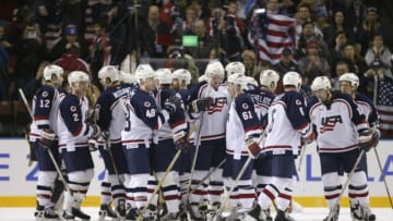 18 Feb 2002: Team USA celebrates their 7-1 victory over Belarus during the Salt Lake City Winter Olympic Games at the E Center in Salt Lake City, Utah. DIGITAL IMAGE. Mandatory Credit: Brian Bahr/Getty Images