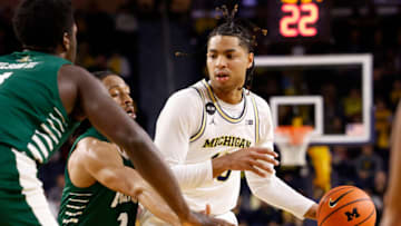 Nov 20, 2022; Ann Arbor, Michigan, USA; Michigan Wolverines guard Jett Howard (13) dribbles defended by Ohio Bobcats guard Miles Brown (2) in the first half at Crisler Center. Mandatory Credit: Rick Osentoski-USA TODAY Sports