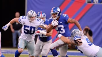 Oct 25, 2015; East Rutherford, NJ, USA; New York Giants running back Rashad Jennings (23) runs for a first down against the Dallas Cowboys in the first half during the NFL game at MetLife Stadium. Mandatory Credit: Robert Deutsch-USA TODAY Sports