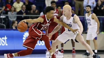 Jan 3, 2017; Fort Worth, TX, USA; Oklahoma Sooners guard Jordan Shepherd (13) dribbles on TCU Horned Frogs guard Jaylen Fisher (0) during the second half at Ed and Rae Schollmaier Arena. TCU won 60-57. Mandatory Credit: Ray Carlin-USA TODAY Sports