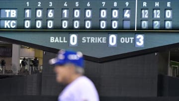 Kansas City Royals first base coach Rusty Kuntz heads to the dugout after Melky Cabrera ground out to end the game with a 12-0 shutout by the Tampa Bay Rays on Aug. 28, 2017 at Kauffman Stadium in Kansas City, Mo. (John Sleezer/Kansas City Star/TNS via Getty Images)