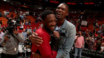MIAMI, FL - OCTOBER 24: Dwyane Wade #3 of the Miami Heat and Chris Bosh are seen celebrating after the game against the New York Knicks on October 24, 2018 at American Airlines Arena in Miami, Florida. NOTE TO USER: User expressly acknowledges and agrees that, by downloading and/or using this photograph, User is consenting to the terms and conditions of the Getty Images License Agreement. Mandatory Copyright Notice: Copyright 2018 NBAE (Photo by Issac Baldizon/NBAE via Getty Images)