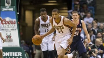 Apr 16, 2014; Milwaukee, WI, USA; Milwaukee Bucks guard Giannis Antetokounmpo (34) heads up court with the ball during the fourth quarter against the Atlanta Hawks at BMO Harris Bradley Center. Atlanta won 111-103. Mandatory Credit: Jeff Hanisch-USA TODAY Sports