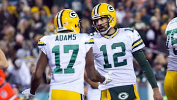 Nov 28, 2016; Philadelphia, PA, USA; Green Bay Packers quarterback Aaron Rodgers (12) congratulates wide receiver Davante Adams (17) after a touchdown against the Philadelphia Eagles during the first quarter at Lincoln Financial Field. Mandatory Credit: Bill Streicher-USA TODAY Sports