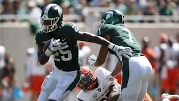 EAST LANSING, MI - SEPTEMBER 02: Darrell Stewart Jr. #25 of the Michigan State Spartans looks for running room after a first half catch while playing the Bowling Green Falcons at Spartan Stadium on September 2, 2017 in East Lansing, Michigan. (Photo by Gregory Shamus/Getty Images)