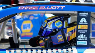 Mar 29, 2015; Martinsville, VA, USA; Sprint Cup Series driver Chase Elliott (25) waits as his car is repaired during the STP 500 at Martinsville Speedway. Mandatory Credit: Randy Sartin-USA TODAY Sports