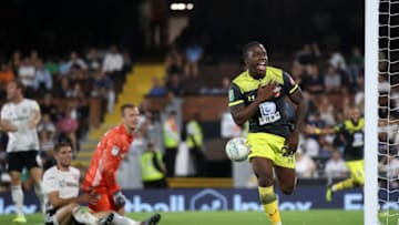 LONDON, ENGLAND - AUGUST 27: Michael Obafemi of Southampton celebrates scoring his team's first goal during the Carabao Cup Second Round match between Fulham and Southampton at Craven Cottage on August 27, 2019 in London, England. (Photo by James Chance/Getty Images)