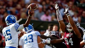 STARKVILLE, MS - OCTOBER 21: Stephen Johnson #15 of the Kentucky Wildcats throws a pass as Jeffery Simmons #94 of the Mississippi State Bulldogs tries to defend during the first half of an NCAA football game at Davis Wade Stadium on October 21, 2017 in Starkville, Mississippi. (Photo by Butch Dill/Getty Images)
