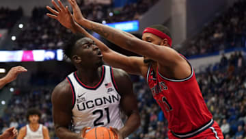 Jan 15, 2023; Hartford, Connecticut, USA; UConn Huskies forward Adama Sanogo (21) looks to shoot against St. John's Red Storm center Joel Soriano (11) in the first half at XL Center. Mandatory Credit: David Butler II-USA TODAY Sports