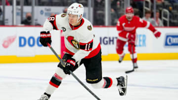 Apr 12, 2022; Detroit, Michigan, USA; Ottawa Senators left wing Tim Stutzle (18) takes a shot during the third period against the Detroit Red Wings at Little Caesars Arena. Mandatory Credit: Raj Mehta-USA TODAY Sports