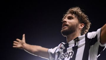 Juventus' Italian midfielder Manuel Locatelli celebrates at the end of the Italian Serie A football match between Torino and Juventus at the "Grande Torino Stadium" in Turin on October 2, 2021. (Photo by MARCO BERTORELLO / AFP) (Photo by MARCO BERTORELLO/AFP via Getty Images)