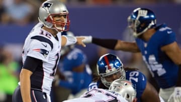Sep 1, 2016; East Rutherford, NJ, USA;New England Patriots quarterback Tom Brady (12) points at the defense of the New York Giants in the first half at MetLife Stadium. Mandatory Credit: William Hauser-USA TODAY Sports