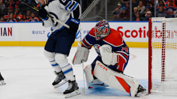 Winnipeg Jets, Kristian Reichel (87); Edmonton Oilers, Stuart Skinner (74). Mandatory Credit: Perry Nelson-USA TODAY Sports