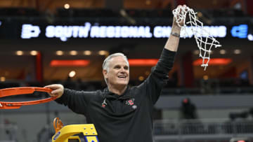 Mar 26, 2023; Louisville, KY, USA; San Diego State Aztecs head coach Brian Dutcher celebrates the win against Creighton Bluejays at the NCAA Tournament South Regional-Creighton vs San Diego State at KFC YUM! Center. Mandatory Credit: Jamie Rhodes-USA TODAY Sports
