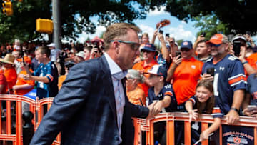 Auburn football head coach Hugh Freeze greets fans during Tiger Walk before Auburn Tigers take on Georgia Bulldogs at Jordan-Hare Stadium in Auburn, Ala., on Saturday, Sept. 30, 2023.