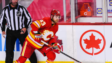 CALGARY, AB - JANUARY 18: Sam Bennett #93 of the Calgary Flames in action against the Vancouver Canucks during an NHL game at Scotiabank Saddledome on January 18, 2021 in Calgary, Alberta, Canada. (Photo by Derek Leung/Getty Images)