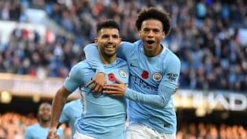 MANCHESTER, ENGLAND - NOVEMBER 05: Sergio Aguero of Manchester City celebrates scoring his sides second goal with Leroy Sane of Manchester City during the Premier League match between Manchester City and Arsenal at Etihad Stadium on November 5, 2017 in Manchester, England. (Photo by Laurence Griffiths/Getty Images)