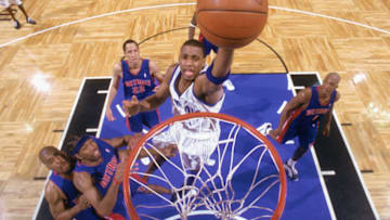 Tracy McGrady goes up for a dunk in a Playoff game against the Detroit Pistons. Photo courtesy of Getty Images.