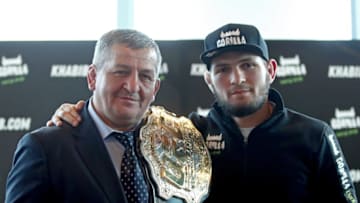 UFC lightweight champion Khabib Nurmagomedov (L) with his father and coach Abdulmanap Nurmagomedov (Photo by Valery SharifulinTASS via Getty Images)