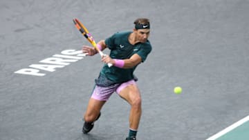 PARIS, FRANCE - NOVEMBER 4: Rafael Nadal of Spain returns against Feliciano Lopez of Spain during day 3 of the Rolex Paris Masters, an ATP Masters 1000 tournament held behind closed doors at AccorHotels Arena formerly known as Paris Bercy on November 4, 2020 in Paris, France. (Photo by Jean Catuffe/Getty Images)