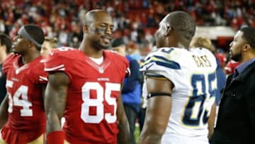 Dec 20, 2014; Santa Clara, CA, USA; San Francisco 49ers tight end Vernon Davis (85, left) speaks with San Diego Chargers tight end Antonio Gates (85) after the game at Levi