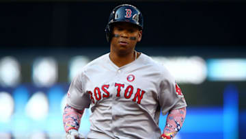 TORONTO, ON - JULY 04: Rafael Devers #11 of the Boston Red Sox runs the bases after hitting a solo home run in the first inning during a MLB game against the Toronto Blue Jays at Rogers Centre on July 04, 2019 in Toronto, Canada. (Photo by Vaughn Ridley/Getty Images)