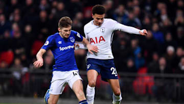 LONDON, ENGLAND - JANUARY 13: Jonjoe Kenny of Everton tackles Dele Alli of Tottenham Hotspur during the Premier League match between Tottenham Hotspur and Everton at Wembley Stadium on January 13, 2018 in London, England. (Photo by Justin Setterfield/Getty Images)