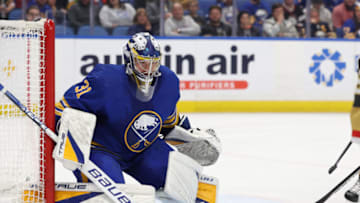Nov 10, 2022; Buffalo, New York, USA; Buffalo Sabres goaltender Eric Comrie (31) looks for the puck during the third period against the Vegas Golden Knights at KeyBank Center. Mandatory Credit: Timothy T. Ludwig-USA TODAY Sports