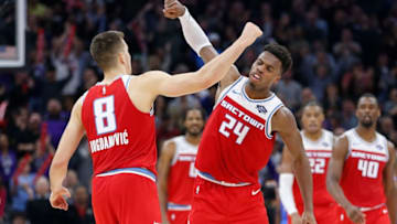 SACRAMENTO, CALIFORNIA - DECEMBER 11: Bogdan Bogdanovic #8 of the Sacramento Kings celebrates a three-point basket with Buddy Hield #24 in the second half against the Oklahoma City Thunder at Golden 1 Center on December 11, 2019 in Sacramento, California. NOTE TO USER: User expressly acknowledges and agrees that, by downloading and/or using this photograph, user is consenting to the terms and conditions of the Getty Images License Agreement. NOTE TO USER: User expressly acknowledges and agrees that, by downloading and/or using this photograph, user is consenting to the terms and conditions of the Getty Images License Agreement. (Photo by Lachlan Cunningham/Getty Images)