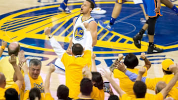 May 30, 2016; Oakland, CA, USA; Golden State Warriors guard Stephen Curry (30) celebrates after scoring a three point basket against the Oklahoma City Thunder during the fourth quarter in game seven of the Western conference finals of the NBA Playoffs at Oracle Arena. The Golden State Warriors defeated the Oklahoma City Thunder 96-88. Mandatory Credit: Kelley L Cox-USA TODAY Sports