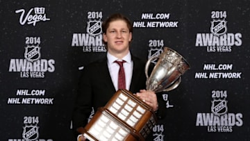LAS VEGAS, NV - JUNE 24: Nathan MacKinnon of the Colorado Avalanche poses after winning the Calder Memorial Trophy during the 2014 NHL Awards at the Encore Theater at Wynn Las Vegas on June 24, 2014 in Las Vegas, Nevada. (Photo by Bruce Bennett/Getty Images)