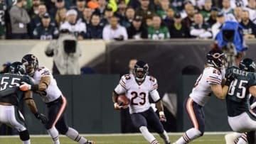 Dec 22, 2013; Philadelphia, PA, USA; Chicago Bears kick returner Devin Hester (23) runs back a kickoff during the first quarter against the Philadelphia Eagles at Lincoln Financial Field. Mandatory Credit: Howard Smith-USA TODAY Sports