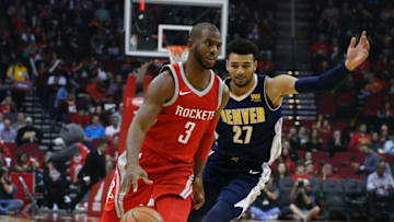 Denver Nuggets Jamal Murray and Houston Rockets Chris Paul (Photo by Bob Levey/Getty Images)