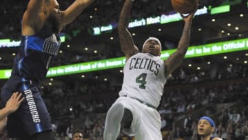 Nov 16, 2016; Boston, MA, USA; Boston Celtics guard Isaiah Thomas (4) drives to the basket past Dallas Mavericks guard Justin Anderson (1) during the second half at TD Garden. Mandatory Credit: Bob DeChiara-USA TODAY Sports