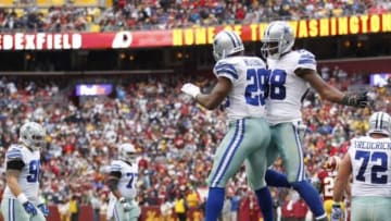 Dec 28, 2014; Landover, MD, USA; Dallas Cowboys running back DeMarco Murray (29) celebrates with Cowboys wide receiver Dez Bryant (88) after scoring a touchdown against the Washington Redskins in the second quarter at FedEx Field. Mandatory Credit: Geoff Burke-USA TODAY Sports