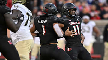 Oct 29, 2022; Louisville, Kentucky, USA; Louisville Cardinals linebacker Dorian Jones (11) celebrates after sacking Wake Forest Demon Deacons quarterback Mitch Griffis (not pictured) during the second half at Cardinal Stadium. Louisville won 48-21. Mandatory Credit: Jamie Rhodes-USA TODAY Sports