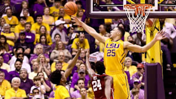 Jan 30, 2016; Baton Rouge, LA, USA; LSU Tigers forward Ben Simmons (25) defends against a shot by Oklahoma Sooners guard Buddy Hield (24) during the first half of a game at the Pete Maravich Assembly Center. Mandatory Credit: Derick E. Hingle-USA TODAY Sports
