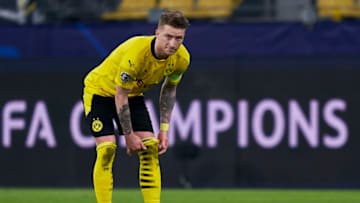 DORTMUND, GERMANY - MARCH 09: Marco Reus of Borussia Dortmund looks on during the UEFA Champions League Round of 16 match between Borussia Dortmund and Sevilla FC at Signal Iduna Park on March 09, 2021 in Dortmund, Germany. Sporting stadiums around Germany remain under strict restrictions due to the Coronavirus Pandemic as Government social distancing laws prohibit fans inside venues resulting in games being played behind closed doors. (Photo by Mateo Villalba/Quality Sport Images/Getty Images)