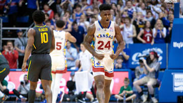Feb 18, 2023; Lawrence, Kansas, USA; Kansas Jayhawks forward K.J. Adams Jr. (24) reacts after a play against the Baylor Bears during the second half at Allen Fieldhouse. Mandatory Credit: William Purnell-USA TODAY Sports